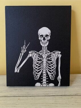 Black Canvas Wall Art with White Skeleton Graphic